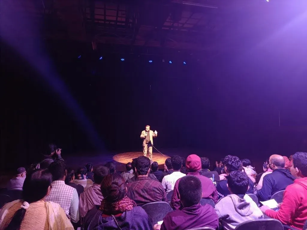 Sami Doha on a comedy club stage